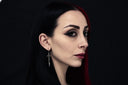 <p>Spiked Gothic Cross Earrings</p>